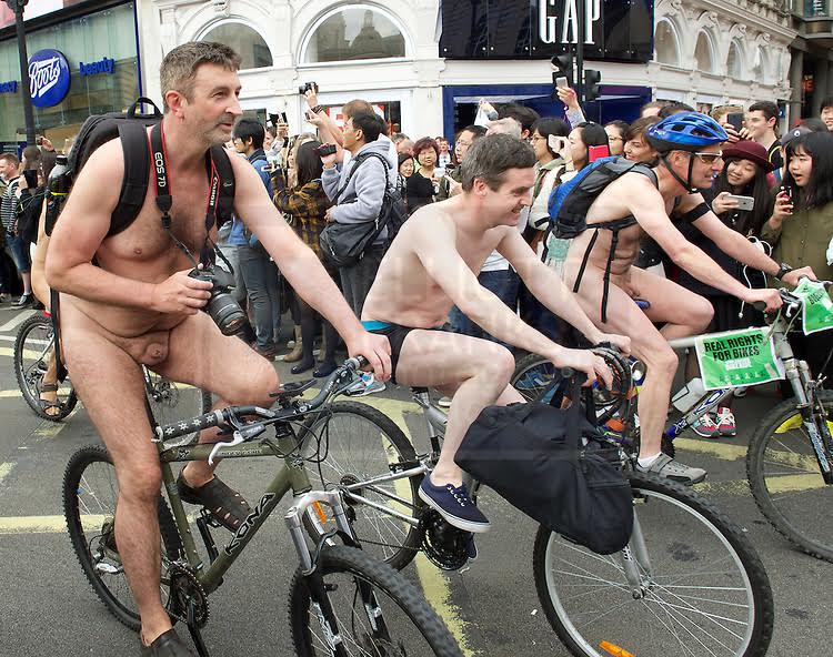 World Naked Bike Ride London 2015  A protest against oil dependency & how cars dominate contemporary life, also a celebration of individuality of the human body.  13th June 2015  Piccadilly Circus, London, Great Britain.  Photograph by Elliott Franks  Image licensed to Elliott Franks Photography Services